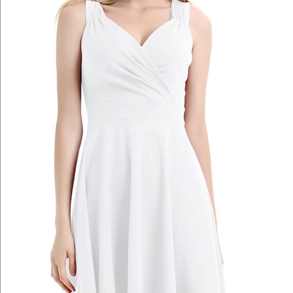 White, sleeveless, flared dress. Size XL
